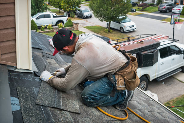 Professional Roofing technician working in South Carver, MA